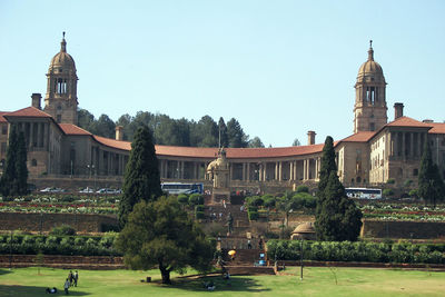 Panoramic view of buildings and city against clear sky