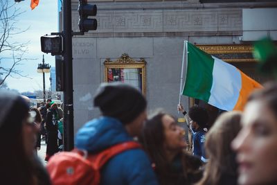 Group of people in front of buildings