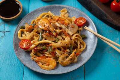 High angle view of noodles in plate on table