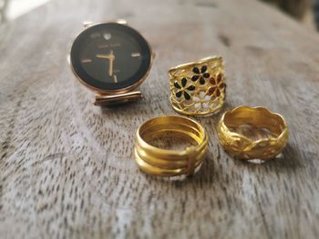 Close-up of wedding rings on table