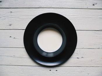 High angle view of black coffee on table