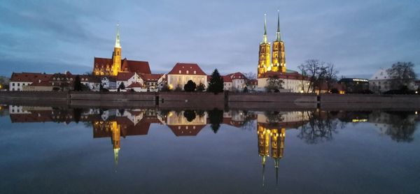 Reflection of buildings in lake