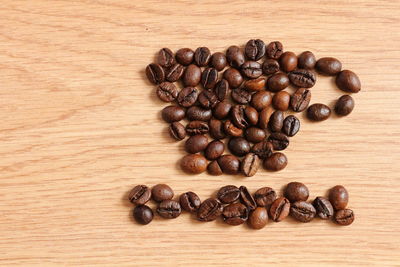 Close-up of coffee beans on table