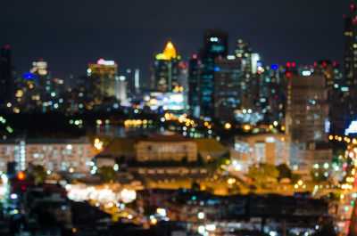 Illuminated buildings in city at night