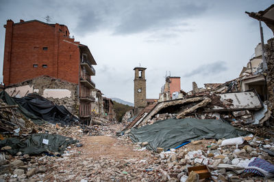 Damaged building against sky