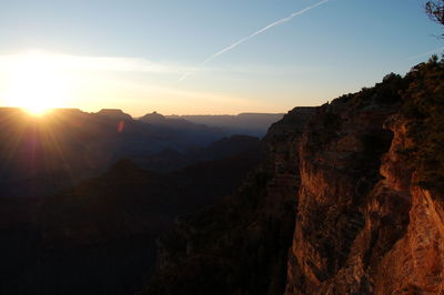 Scenic view of mountains against sky during sunset