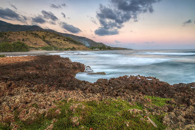 Scenic view of sea against sky during sunset