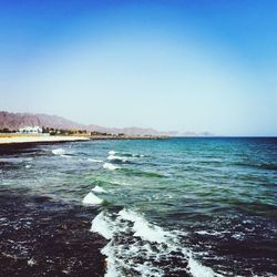 Scenic view of sea against clear sky