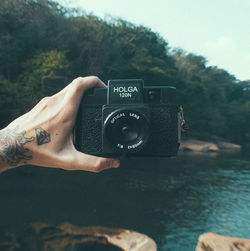 Woman photographing through smart phone