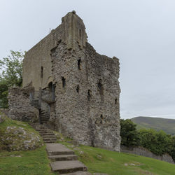 Low angle view of old building against clear sky