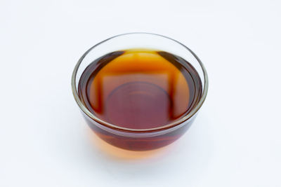 Close-up of drink against white background