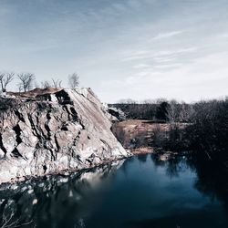 Scenic view of landscape against cloudy sky