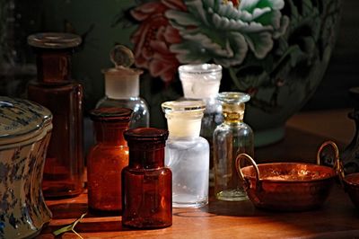 Close-up of glass containers on table