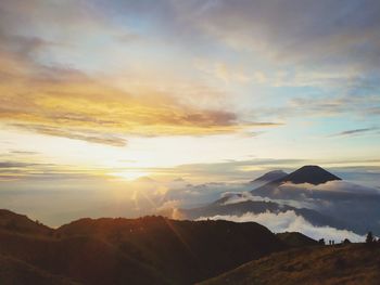 Scenic view of landscape against sky during sunset