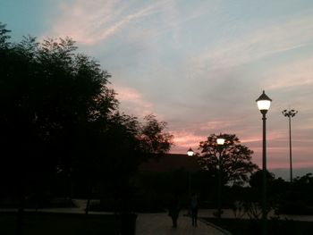 Street light against sky at dusk