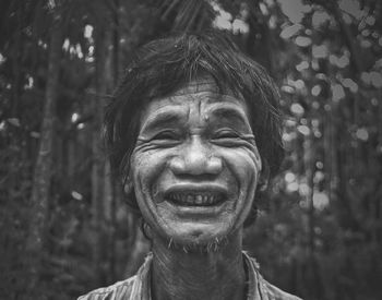 Portrait of a smiling young man outdoors