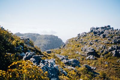 Scenic view of mountains against clear sky