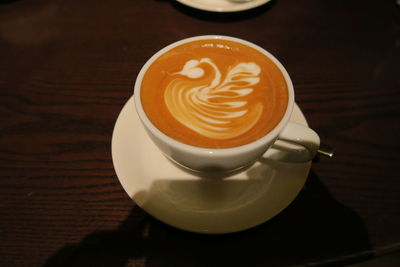 High angle view of cappuccino on table