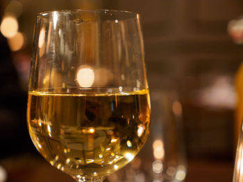 Close-up of wine glass on table
