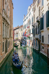 Canal passing through city buildings