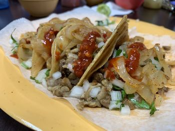 Close-up of food served on table