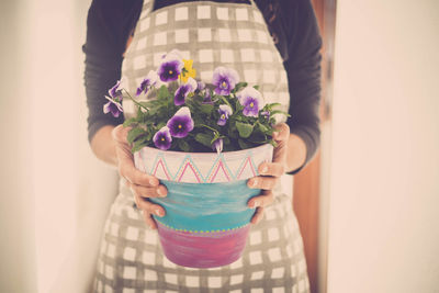 Close-up of woman holding bouquet