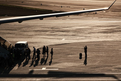 High angle view of people at airport runway
