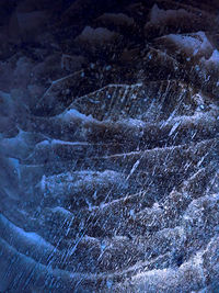 Full frame shot of snow on rock