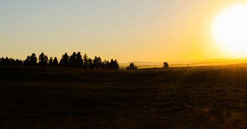 Scenic view of landscape at sunset