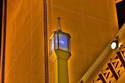 Low angle view of tower bridge at night