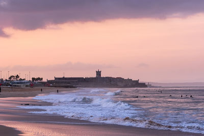 Scenic view of sea against sky during sunrise