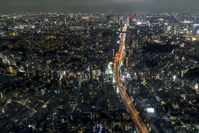 Illuminated cityscape at night