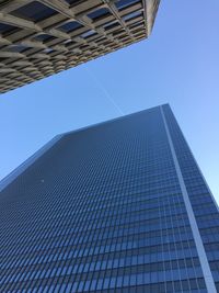 Low angle view of modern building against clear sky