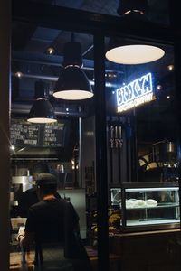 Rear view of people sitting in restaurant