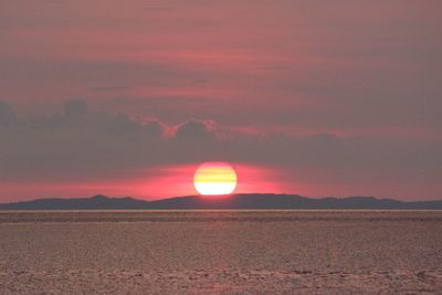 Scenic view of silhouette landscape against sky during sunset