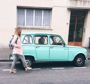 Full length of woman in car