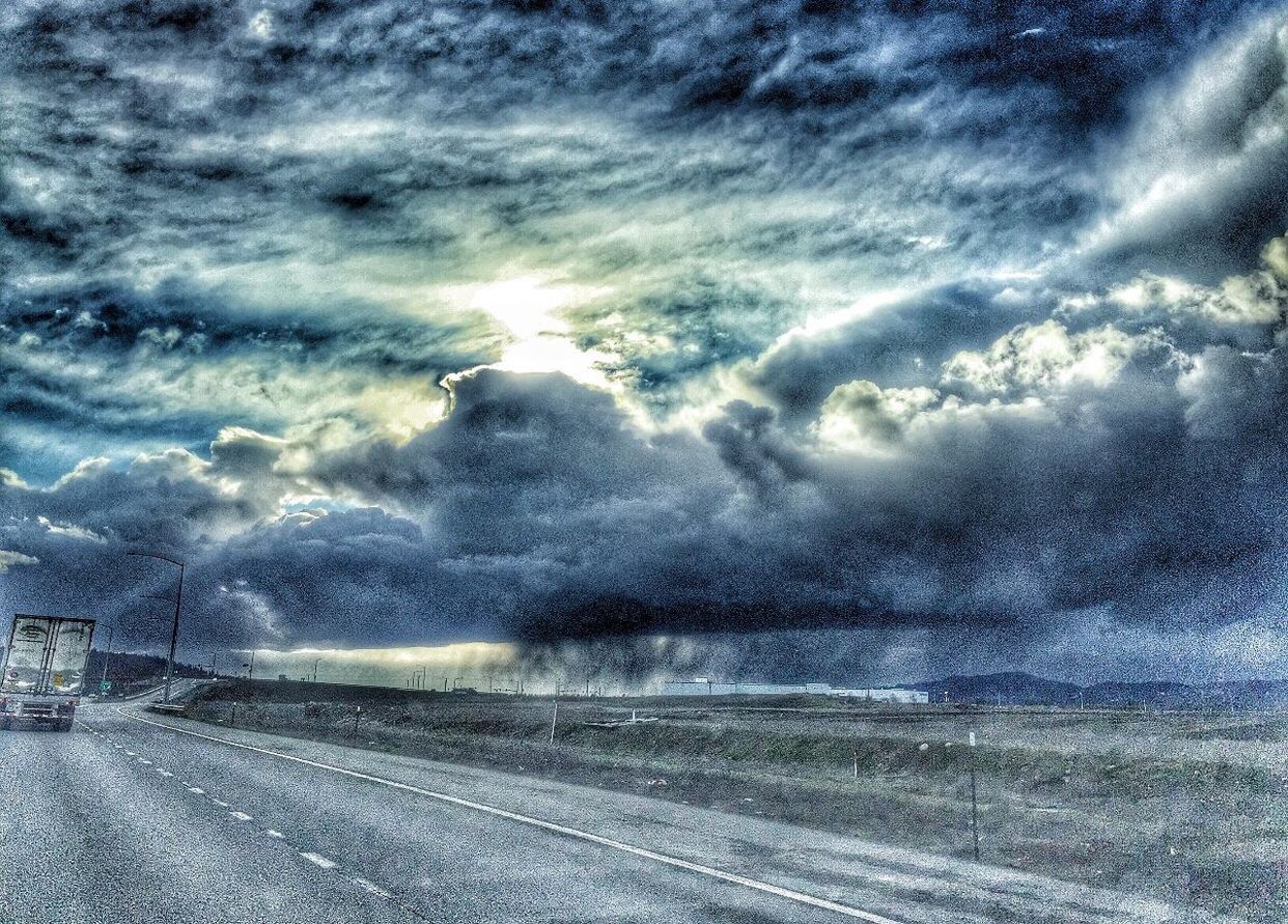 sky, cloud - sky, weather, cloudy, road, landscape, transportation, tranquil scene, tranquility, scenics, nature, beauty in nature, field, cloud, overcast, winter, snow, the way forward, storm cloud, cold temperature