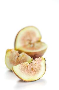 Close-up of fruit against white background