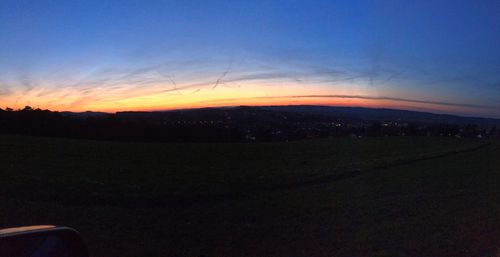 Scenic view of silhouette landscape against sky during sunset