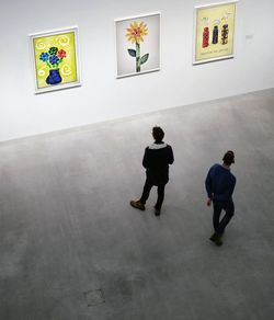 Men standing in front of museum