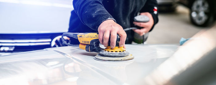 Mechanic repairing car