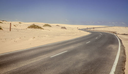 Scenic view of desert against clear sky