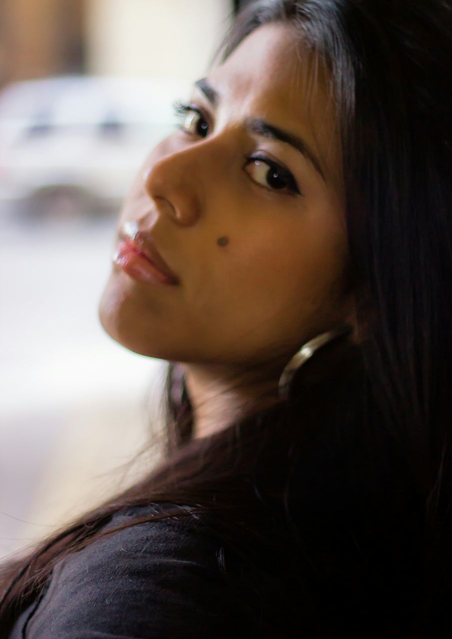 headshot, young adult, young women, person, lifestyles, portrait, looking at camera, close-up, indoors, long hair, human face, leisure activity, front view, contemplation, beauty, head and shoulders, focus on foreground