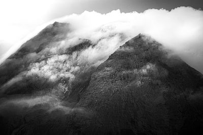 Low angle view of mountain range against sky