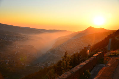 Scenic view of mountains at sunset