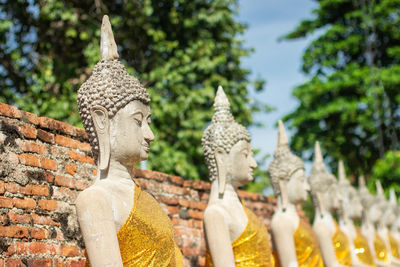 Statue against temple