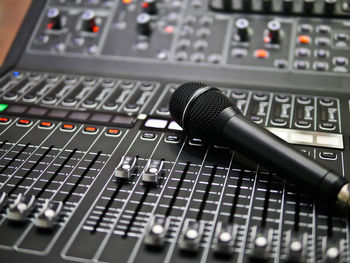 Close-up of microphone and sound recording equipment