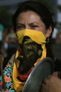 Close-up of woman wearing scarf