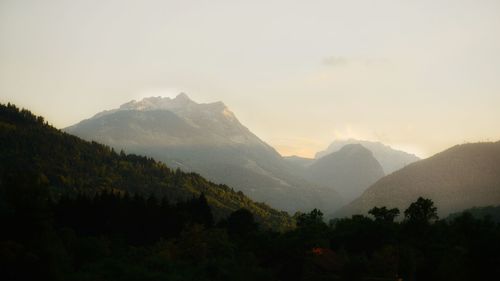 Scenic view of mountains against sky during sunset