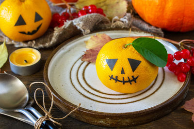 Close-up of pumpkins in plate on table